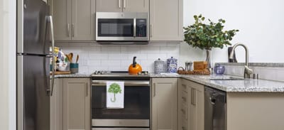 Well-equipped kitchen area in a modern facility.
