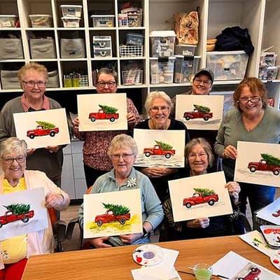 Residents engaging in an art activity together
