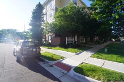 Exterior view of Sunrise at Cherry Creek with signage