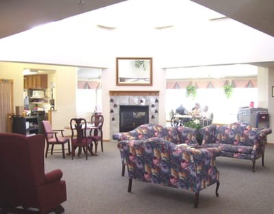 Cozy common area with seating and residents