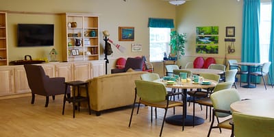 Common area with seating and decor for residents.