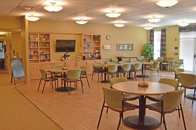 Common dining area with tables and chairs.