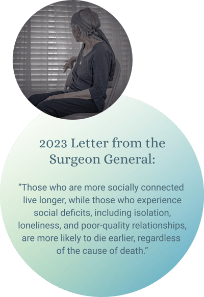 Woman sitting in front of window, reading text.
