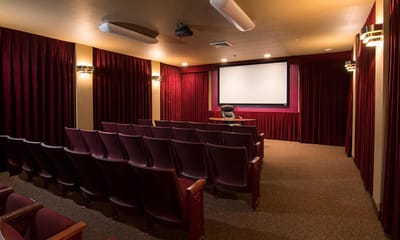 Interior of a small theater with seating
