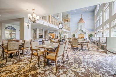 Spacious dining area with tables and unique decor