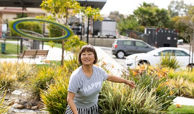 Resident enjoying outdoor activity in the garden