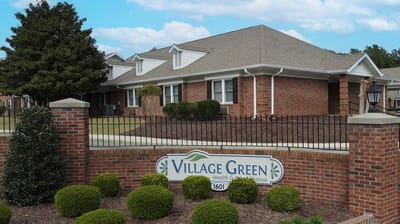 Exterior view of Village Green Health and Rehabilitation facility.
