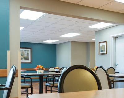 Interior dining area with tables and artwork