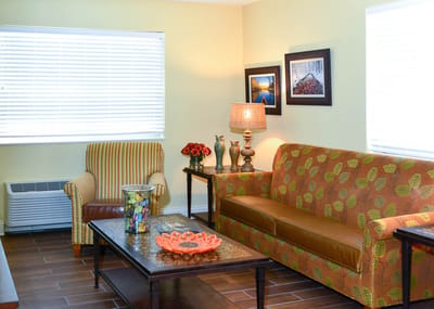 Cozy common area with seating and decorative elements.