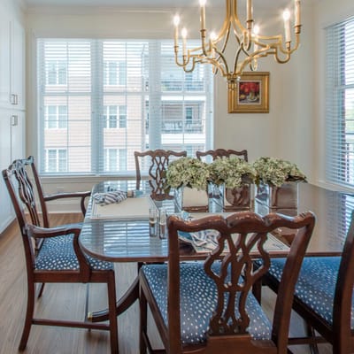 Elegant dining room setup with a chandelier