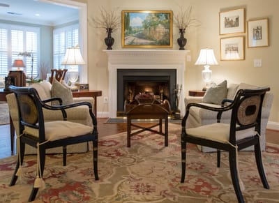 Cozy living room with chairs and fireplace