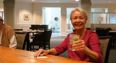 Resident enjoying a drink in a common area