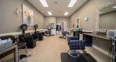 Interior of a salon with hair styling stations