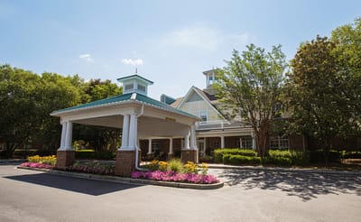 Exterior view of Wildewood Downs retirement community entrance