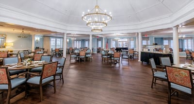 Dining area with tables and chairs set up
