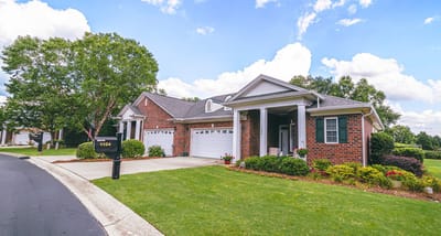 Exterior view of a residential building with landscaping
