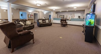 Common area with seating and fish tank
