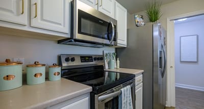 A modern kitchen interior with appliances