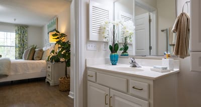 A bright and inviting bathroom in a resident room