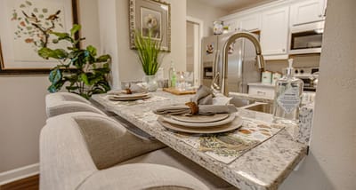 Modern kitchen area with dining setup