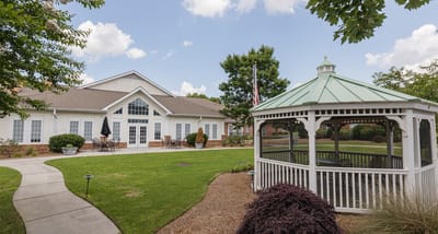 Exterior view of the facility with gazebo and greenery