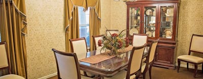 Elegant dining room with a large table and decor