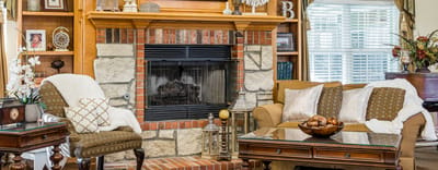 Cozy common area with comfortable seating and a fireplace