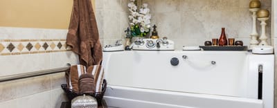 A clean, well-appointed bath area with accessories