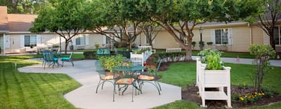 Serene outdoor courtyard with seating and greenery