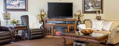 Comfortable common area with seating and TV