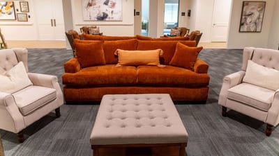 Cozy living area with a couch and chairs