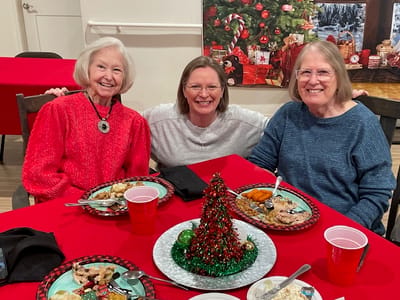 Residents enjoying a meal together during a celebration