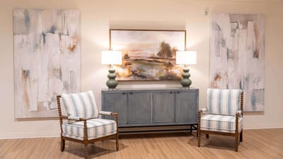 Cozy lobby area with decorative art and seating