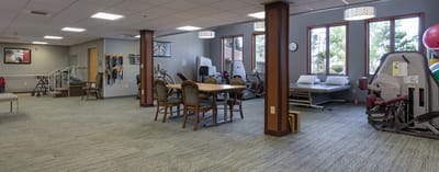 Interior view of a rehabilitation room with exercise equipment
