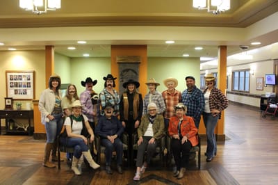 Residents and staff participating in a themed event