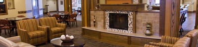 Interior view of a cozy common area with seating