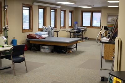 Therapy room with equipment and windows