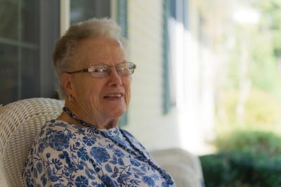 Resident enjoying a moment in the outdoor space