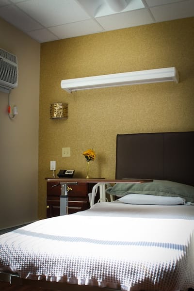 A well-furnished private resident room