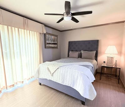Cozy resident bedroom with natural light