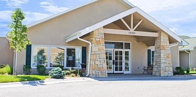 Exterior view of Homestead Estates building entrance.