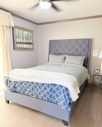 Cozy bedroom with a queen-size bed and decor