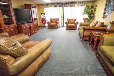 Common area with comfortable seating and TV