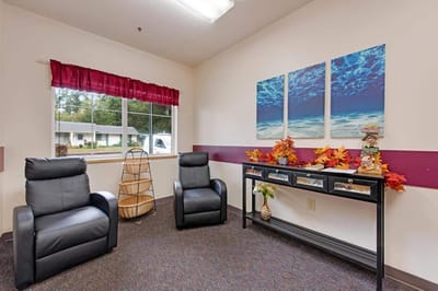 Cozy lounge area with comfortable seating and decorations.