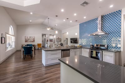 Well-lit kitchen area with modern design.