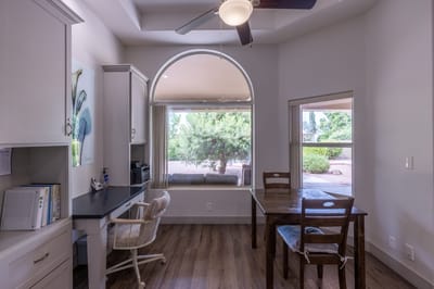 Bright interior room with a desk and view