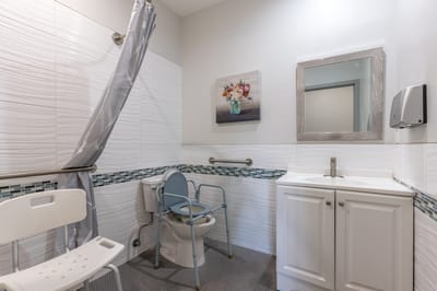 Accessible bathroom with safety features and decor