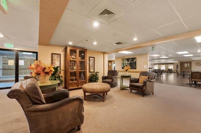 Interior lounge area with seating and decorations.