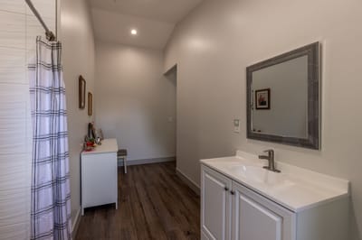 Neatly arranged private bathroom in the facility.
