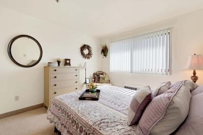Cozy bedroom with a comfortable bed and decor